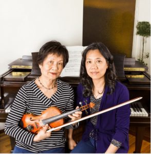 Violin Teacher With Student